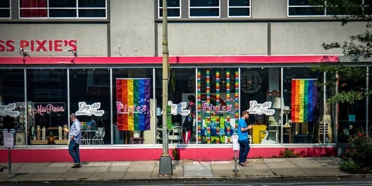 Washington DC storefront with rainbow flags for LGBTQ pride